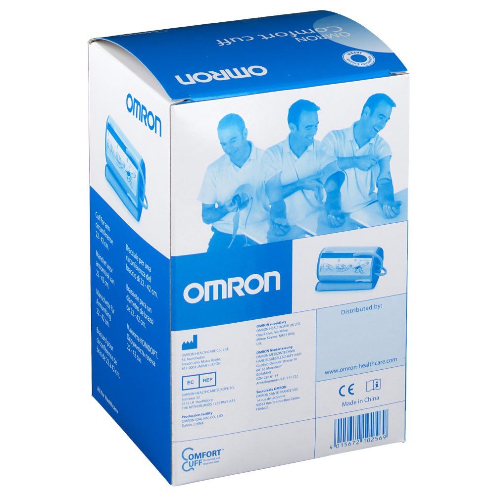 Emballage de la manchette OMRON Komfort. Boîte bleue avec image et texte. Logo OMRON et informations produit.