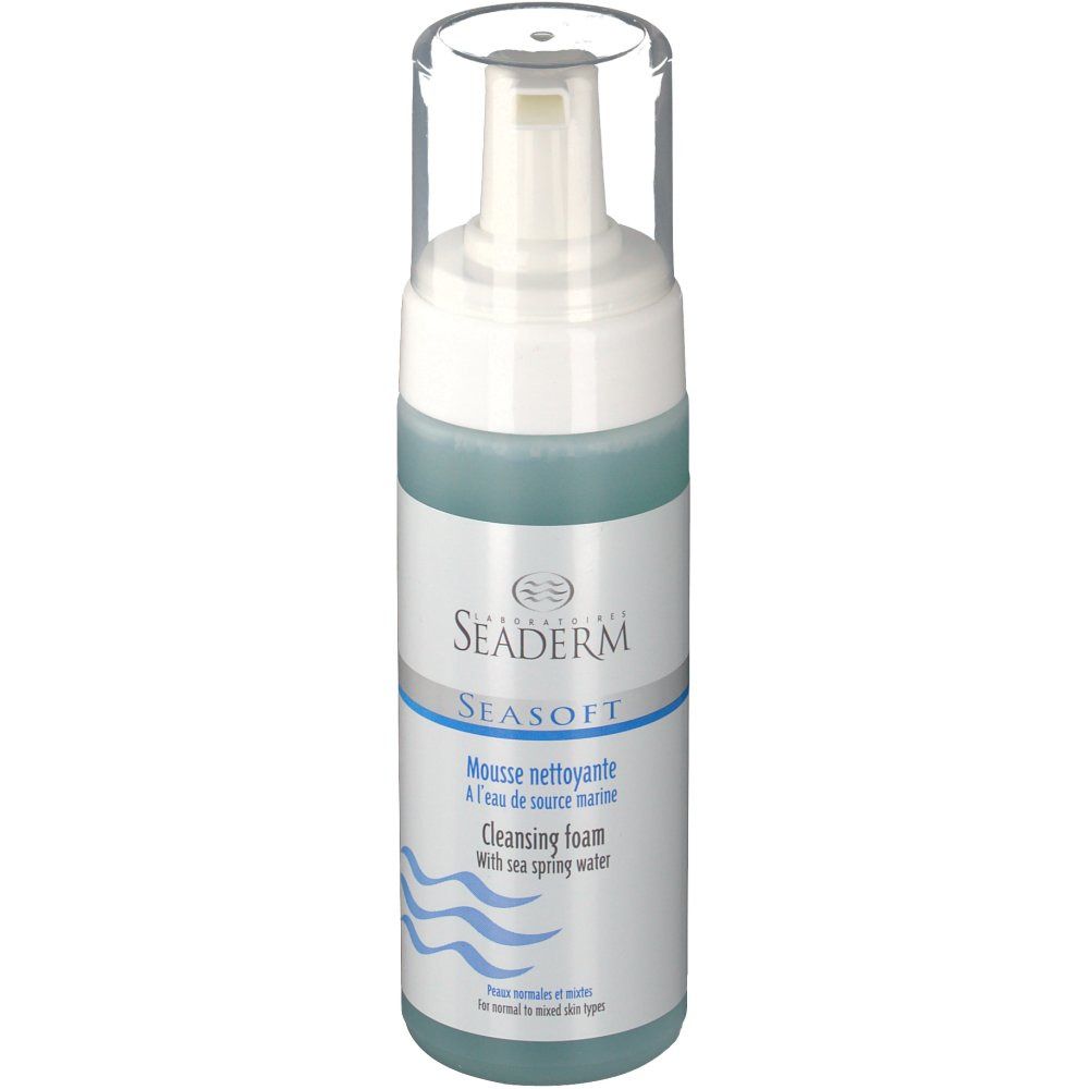 Flacon de mousse nettoyante avec pompe blanche et bouchon transparent. Liquide bleu visible. Texte: SEADERM, SEASOFT, Mousse nettoyante.