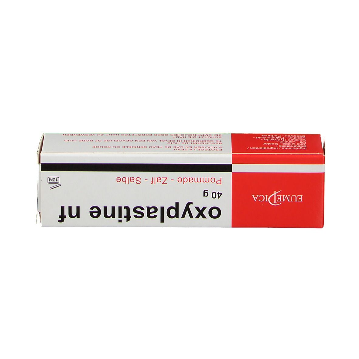 Boîte oxyplastine nf, rouge et blanc. Inscription: 40 g, Pommade-Zalf-Salbe. Fabricant: EUMEDICA. Texte en allemand.