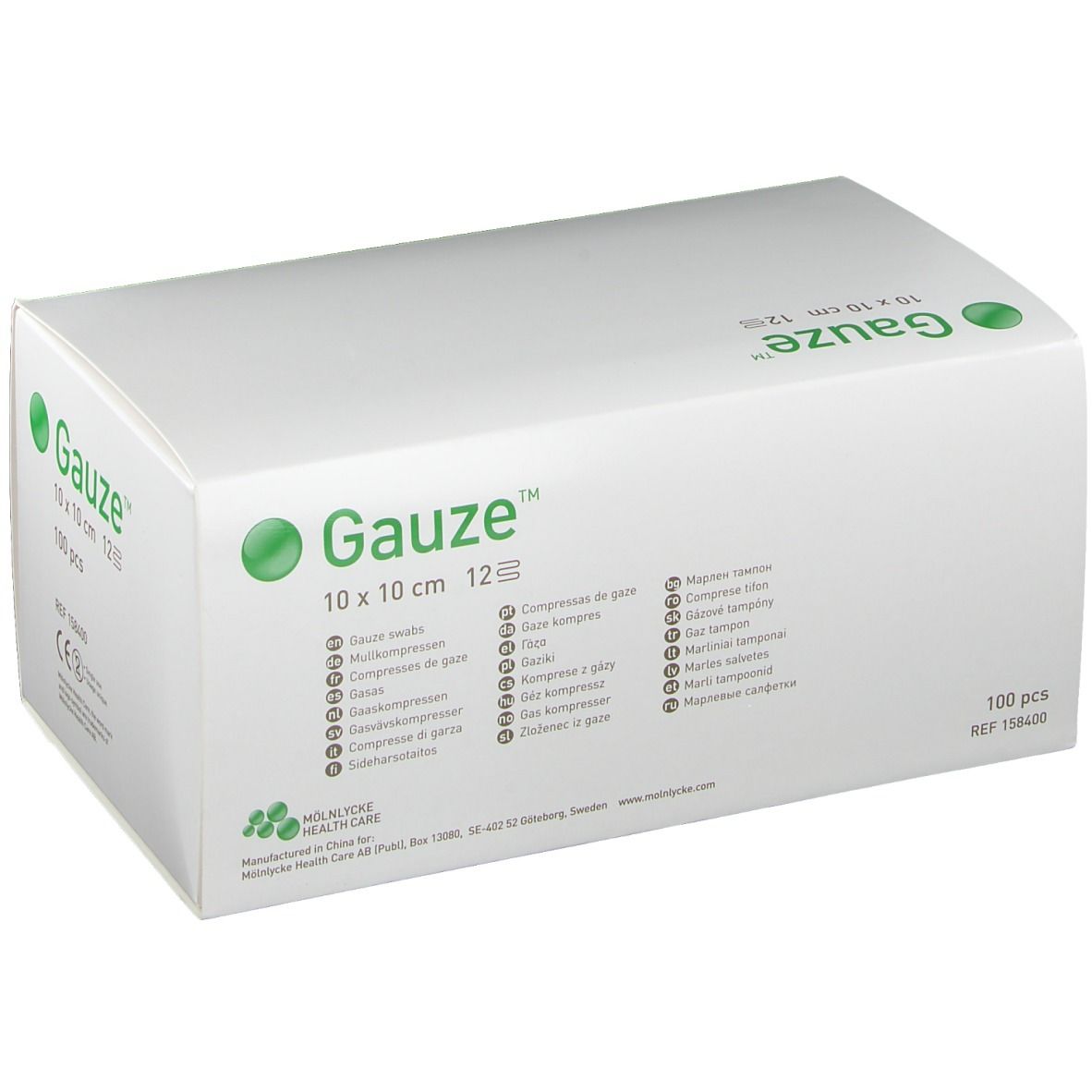 Emballage blanc avec inscription verte "Gauze", 10x10 cm, 12 couches. Désignations multilingues du produit.