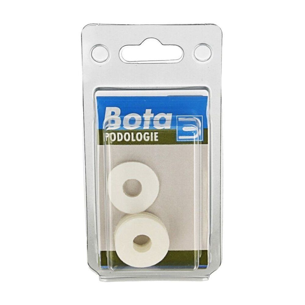 Emballage blister avec deux produits annulaires blancs. L'emballage porte la mention "Bota podologie".