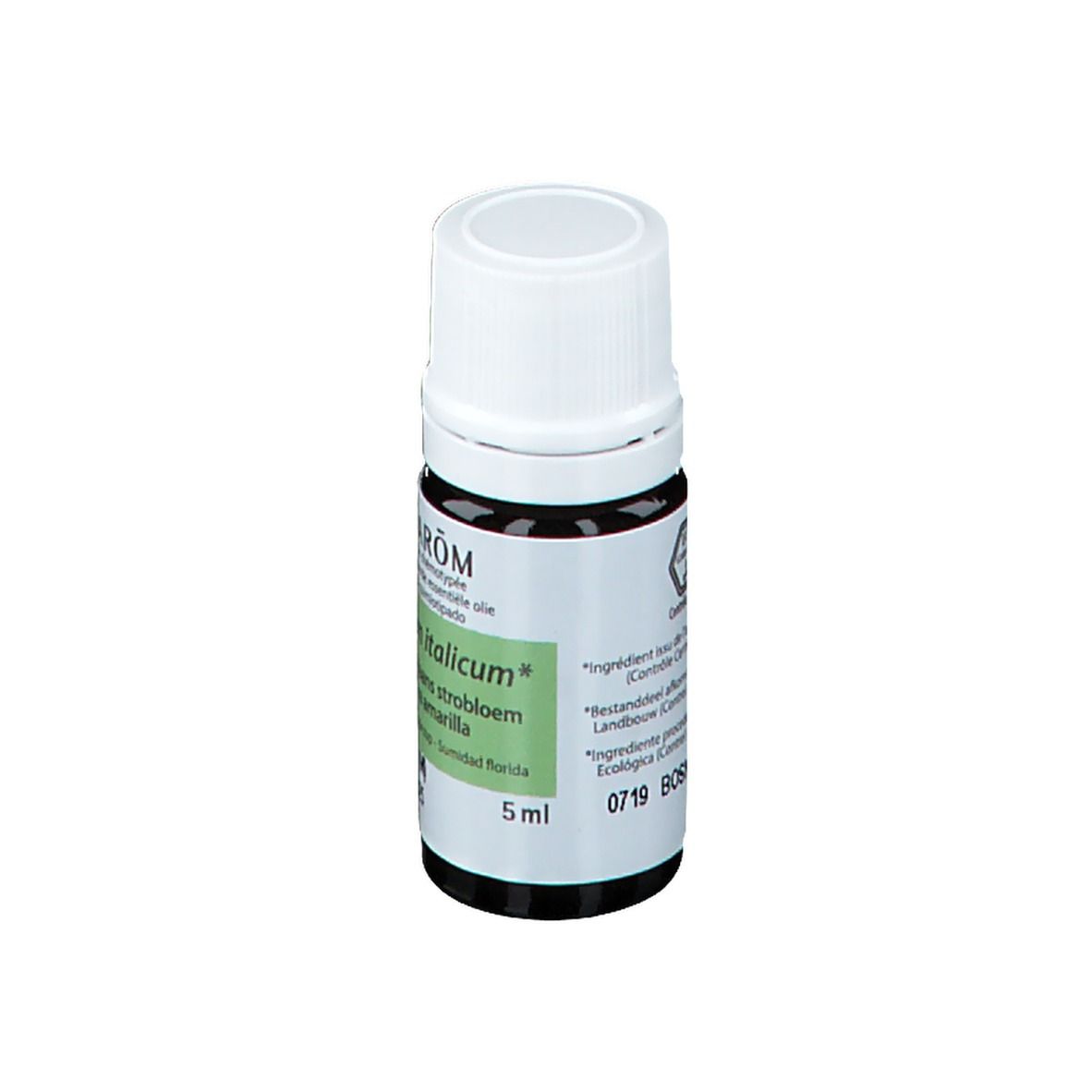 Flacon en verre brun avec bouchon blanc. Étiquette avec nom du produit et marque PRANAROM. 5 ml.