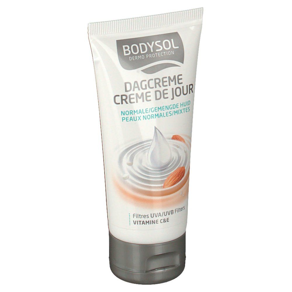 Tube de crème avec nom et illustration du produit. Contient des filtres UVA/UVB et de la vitamine C&E. Pour peaux normales.