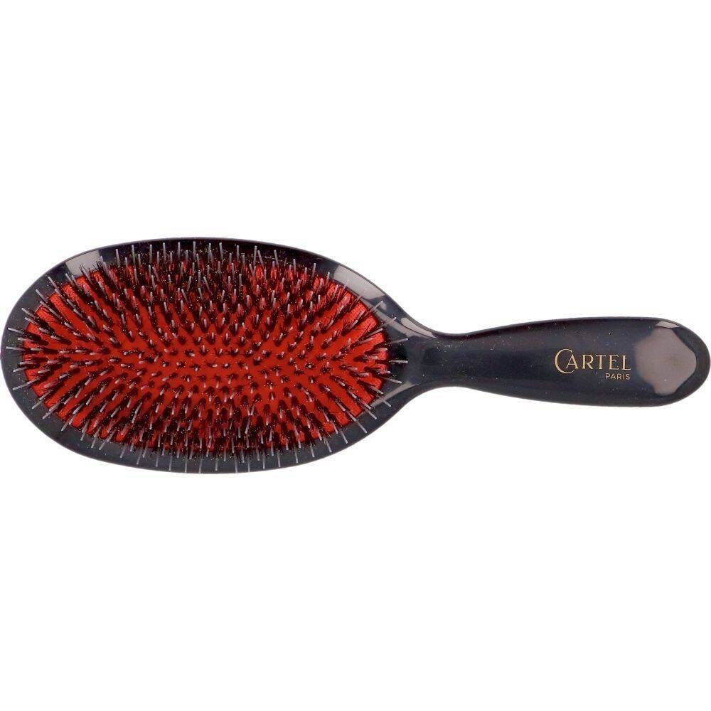 Brosse ovale noire et rouge. Inscription CARTEL PARIS sur le manche.