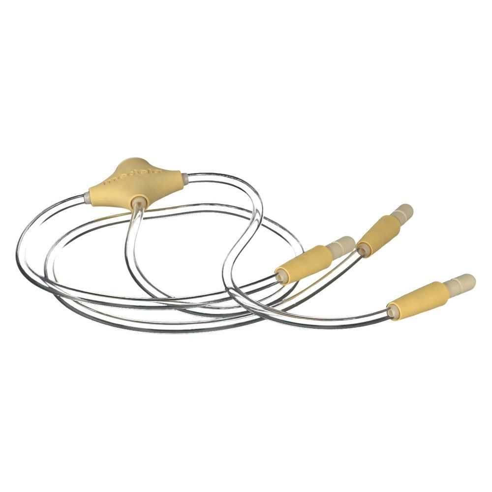 Tube Medela Freestyle PVC. Tubes en plastique jaune et transparent avec trois connecteurs.