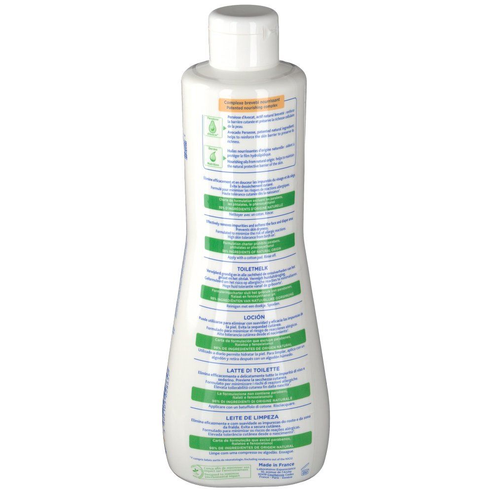 Dos d'un flacon blanc. Texte en plusieurs langues. Accents verts et oranges. Contient des informations sur le produit.