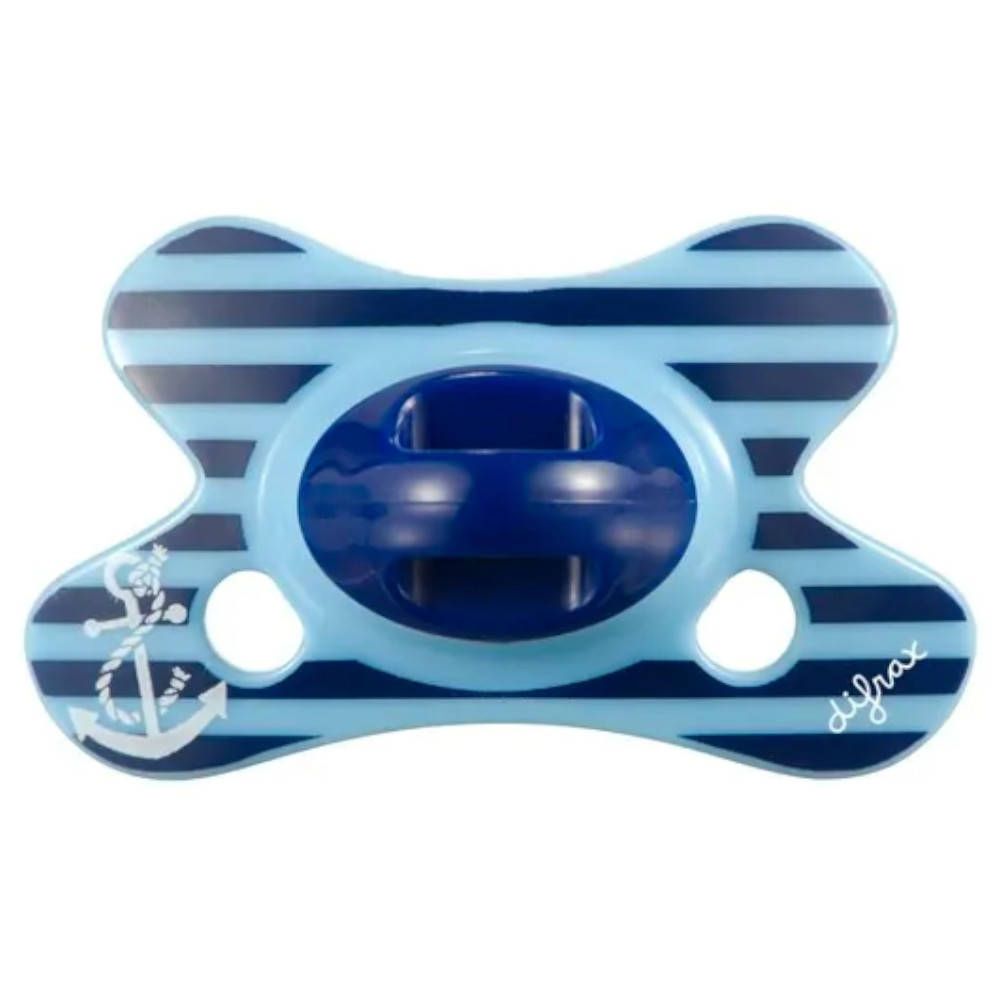 Sucette verte dans son emballage. Marque difrax®. Pour 0-6 mois. Design dentaire. Emballage transparent.