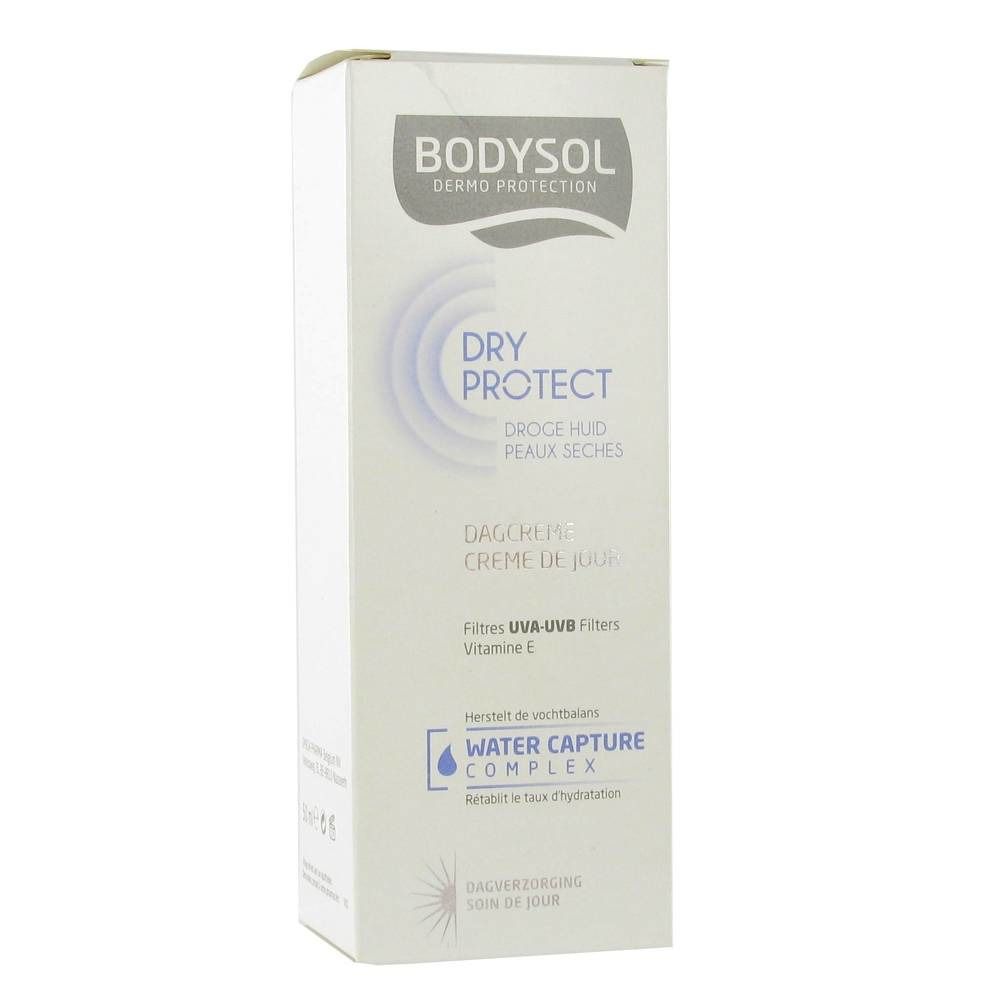 Boîte blanche Bodysol. Inscription: Dry Protect, Dagcrème, Crème de Jour, Droge Huid, Peaux Seches. Filtres UVA/UVB, Vitamine E. Water Capture Complex.