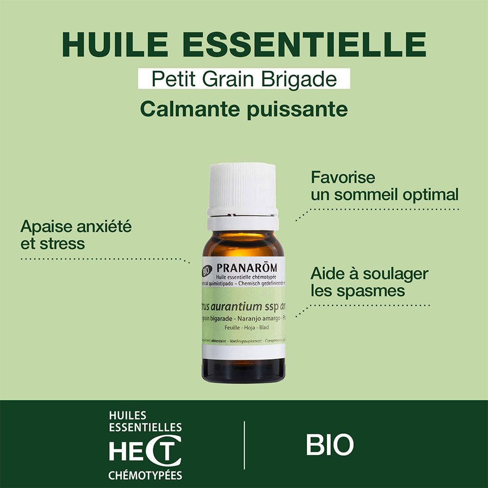 Flacon en verre brun avec bouchon blanc. Étiquette avec nom et marque. Label BIO.