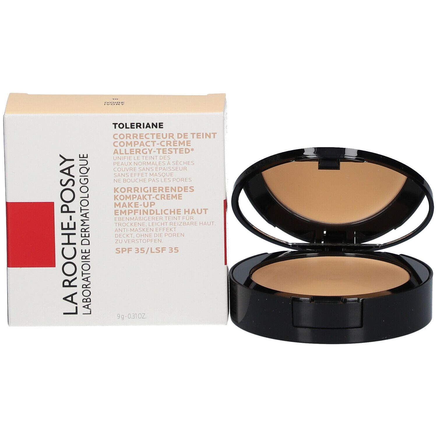 Maquillage compact et emballage. Boîtier de maquillage noir, poudre visible. Emballage à côté.