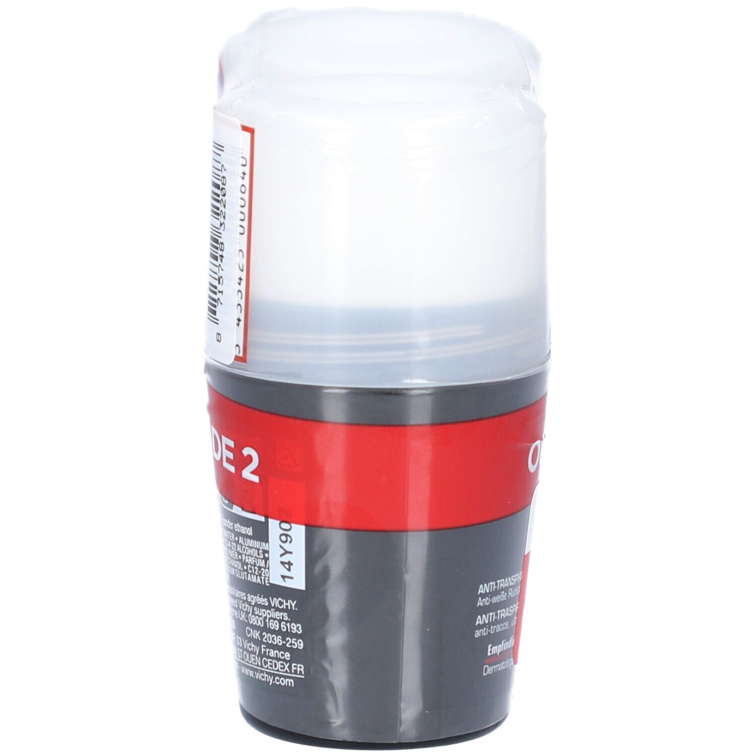 Roll-on déodorant dans son emballage. Récipient noir avec roll-on blanc. Bande rouge. Texte: Duo. Autocollant d'informations.
