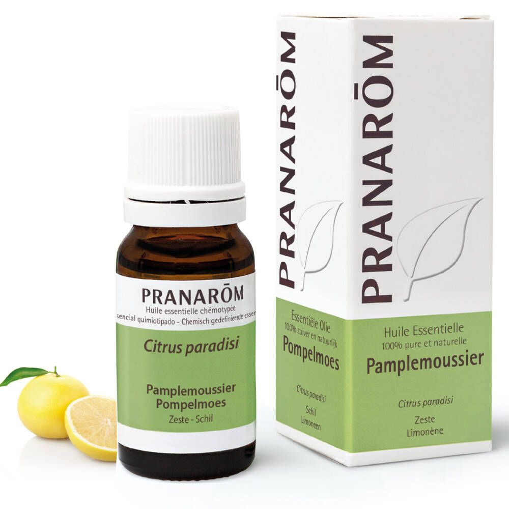 Flacon en verre brun et boîte PRANAROM. Étiquette Citrus paradisi. Image de pamplemousse.