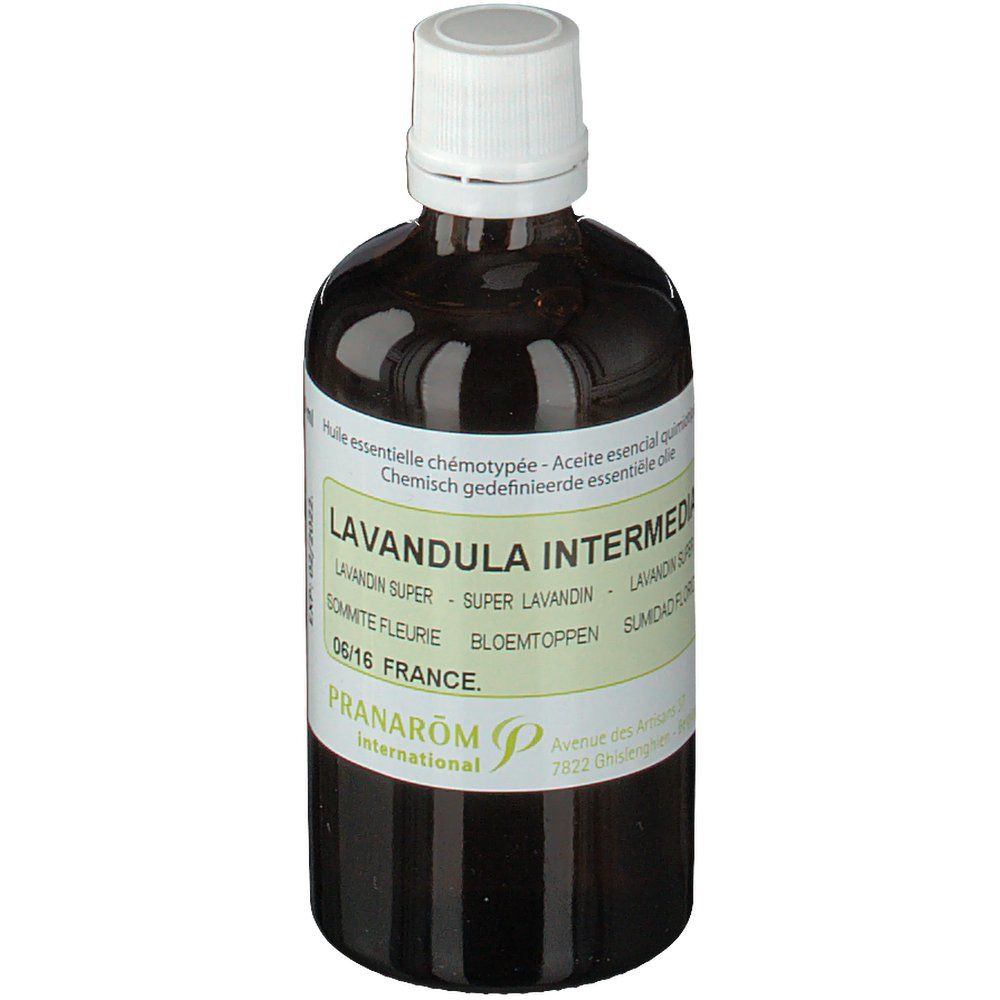 Flacon en verre brun avec bouchon blanc. Étiquette avec nom du produit et marque PRANAROM. Texte multilingue.