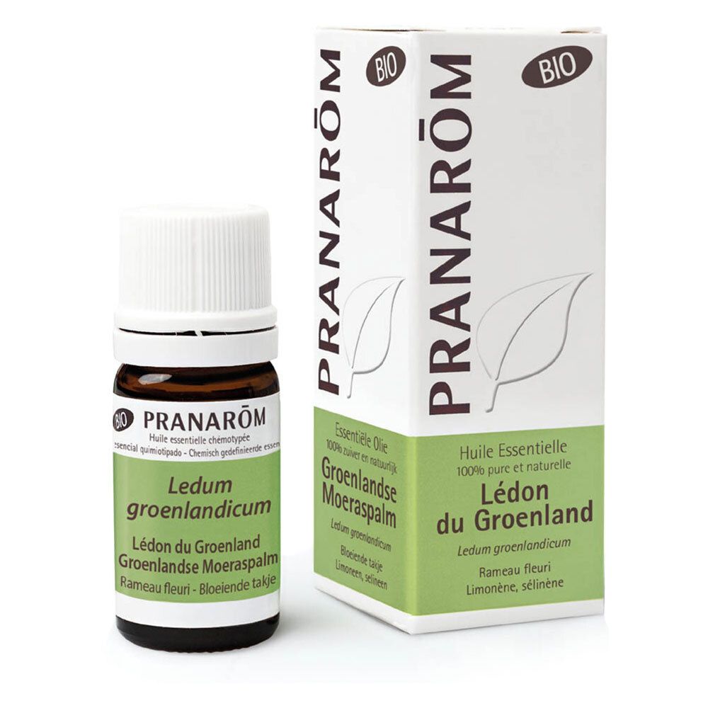 Flacon en verre brun avec bouchon blanc et étiquette. Nom du produit et certification biologique.