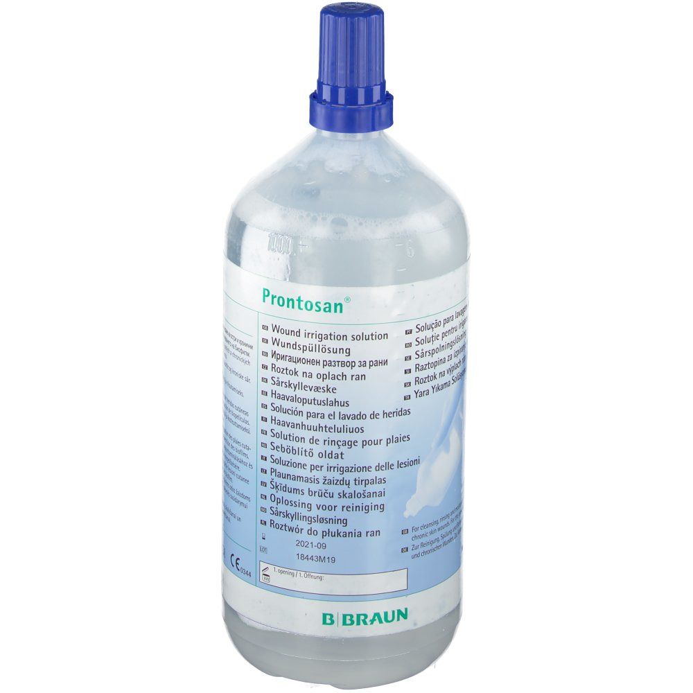 Flacon avec bouchon bleu. Inscription : Prontosan. Étiquette du produit avec informations. Marque B. Braun.