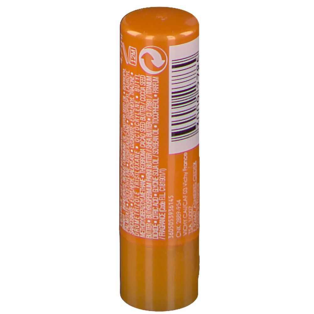 Dos d'un stick à lèvres orange. Code-barres et informations textuelles.