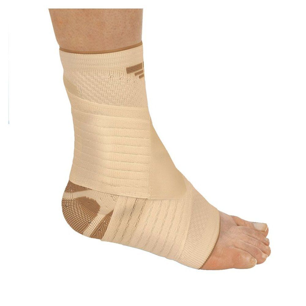 Attelle de cheville couleur peau. Beige avec accents marron. Velcro et silicone.