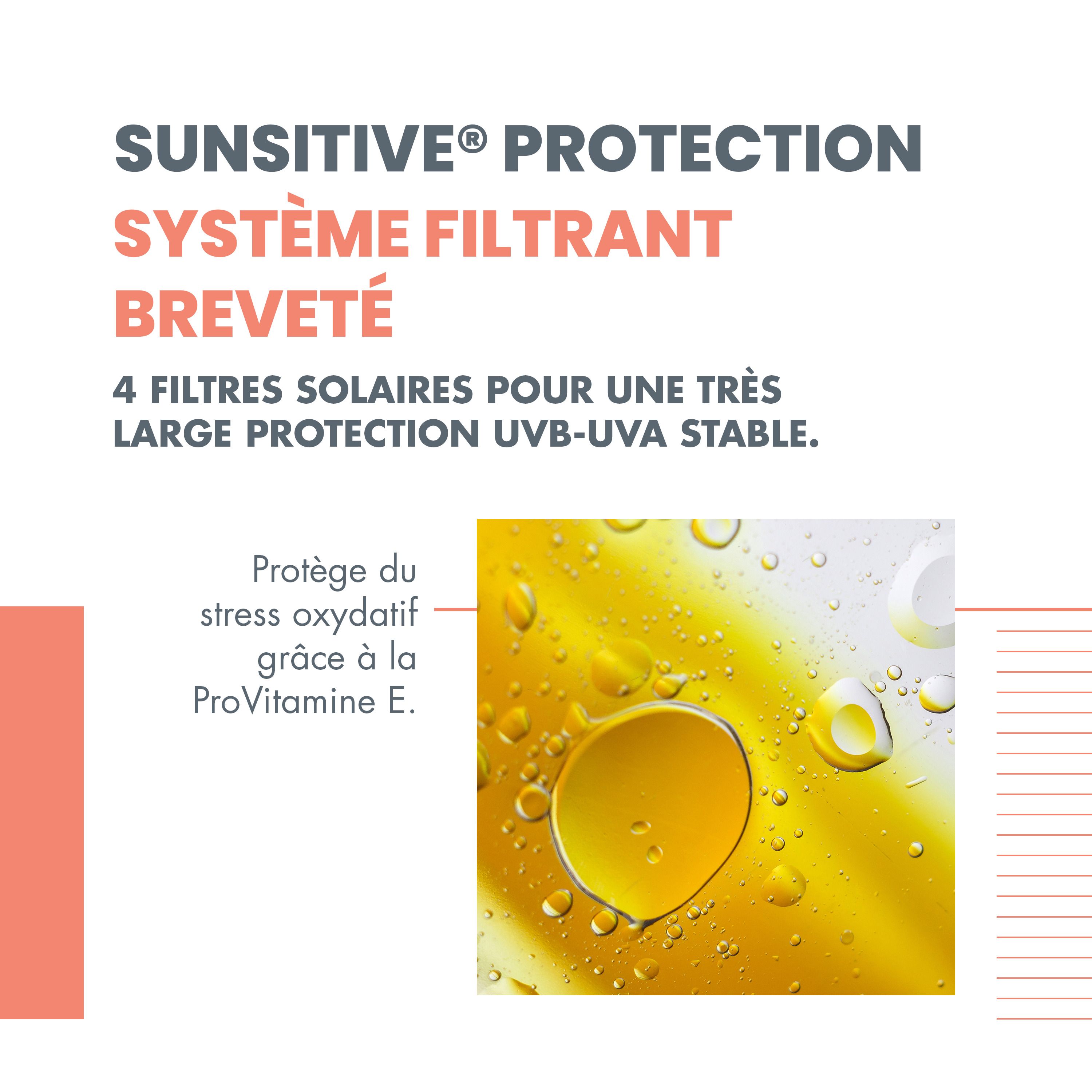 Flacon orange avec bouchon blanc. Inscription: Eau Thermale Avène, SPF 30, Spray.