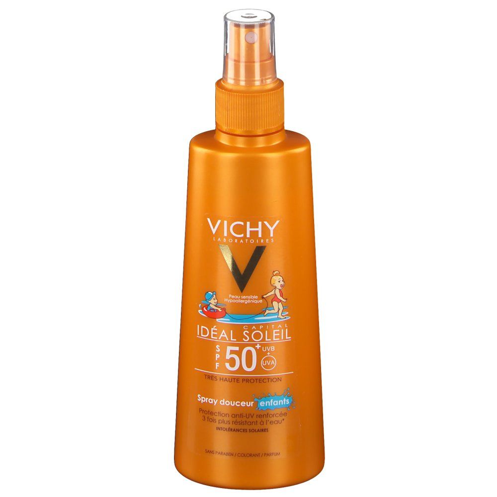 Flacon spray orange avec logo VICHY et nom du produit. Inscription : Idéal Soleil 50+ pour enfants. Illustration d'enfants.