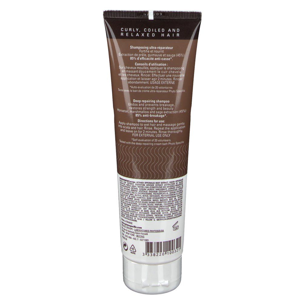 Tube de shampooing réparateur profond. Tube marron avec texte et motif ondulé. Inscription : Curly, Coiled and Relaxed Hair.