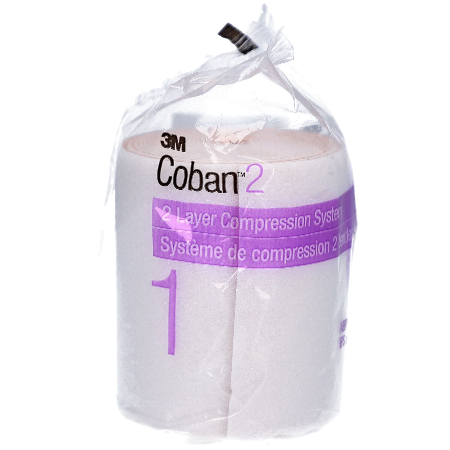 Rouleau emballé 3M Coban 2. Inscription : 2 Layer Compression System, 1. Bandage blanc, accent violet. En film.