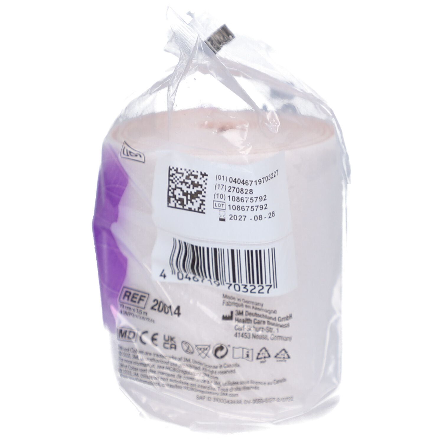 Rouleau emballé 3M Coban 2. Inscription : Informations produit, code-barres, REF 20014. Bandage blanc, accent violet. En film.