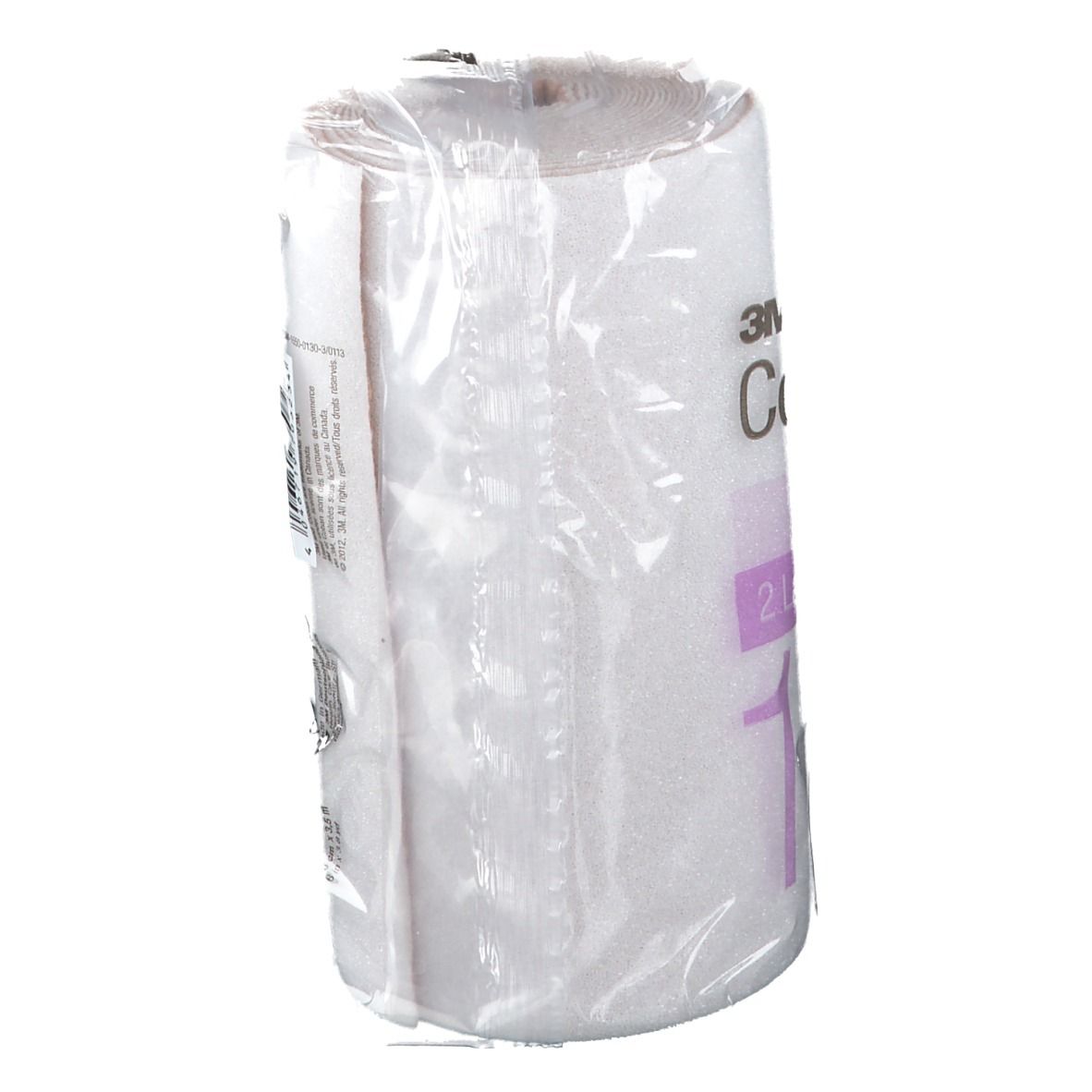 Bandage blanche emballée. Inscription : 3M Coban 2, système 2 couches, 15 cm.