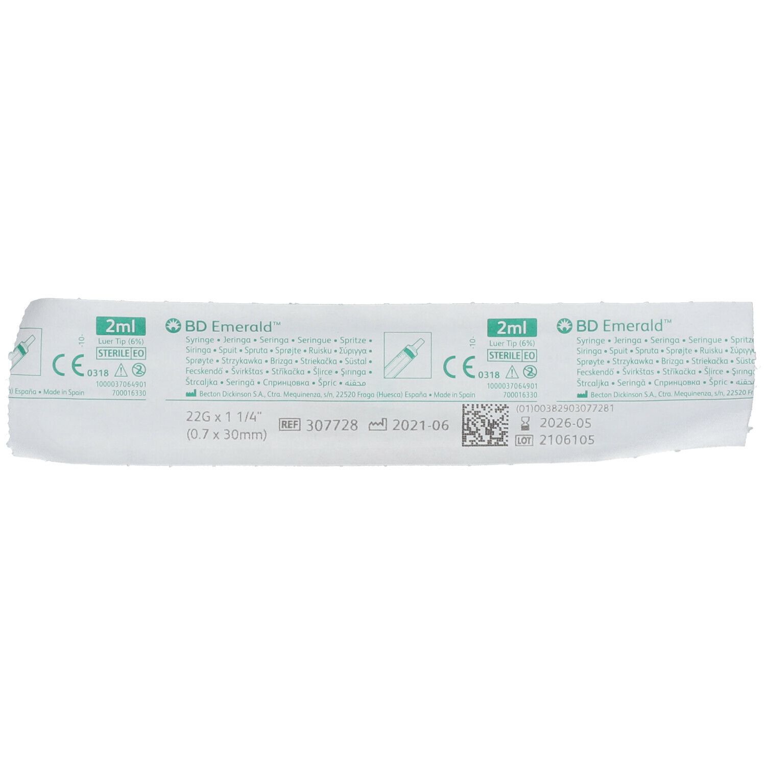 Emballage de seringue. Inscription: BD Emerald, 2 ml, 22G x 1 1/4 (0,7 x 30 mm). Marquage CE et numéro de lot.