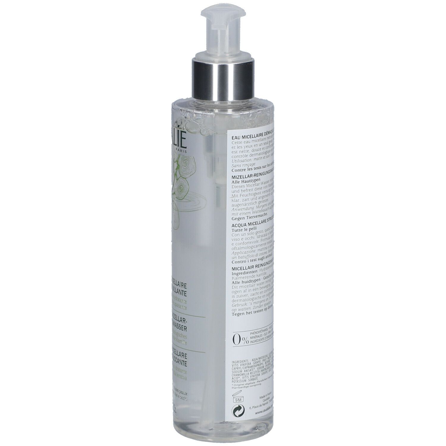 Flacon transparent avec pompe. Inscription CAUDALIE. Étiquette avec informations produit. Flacon légèrement incliné.