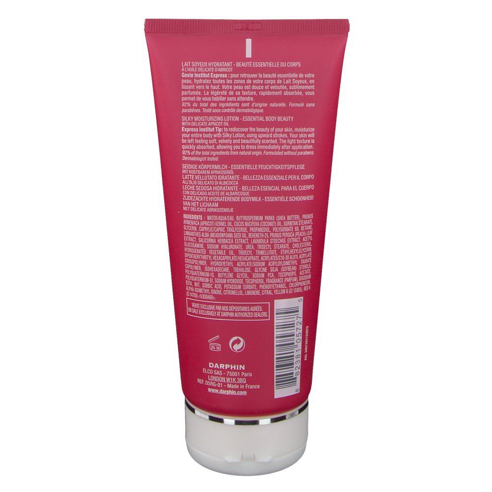 Dos du tube rouge. Texte multilingue. Bouchon blanc.