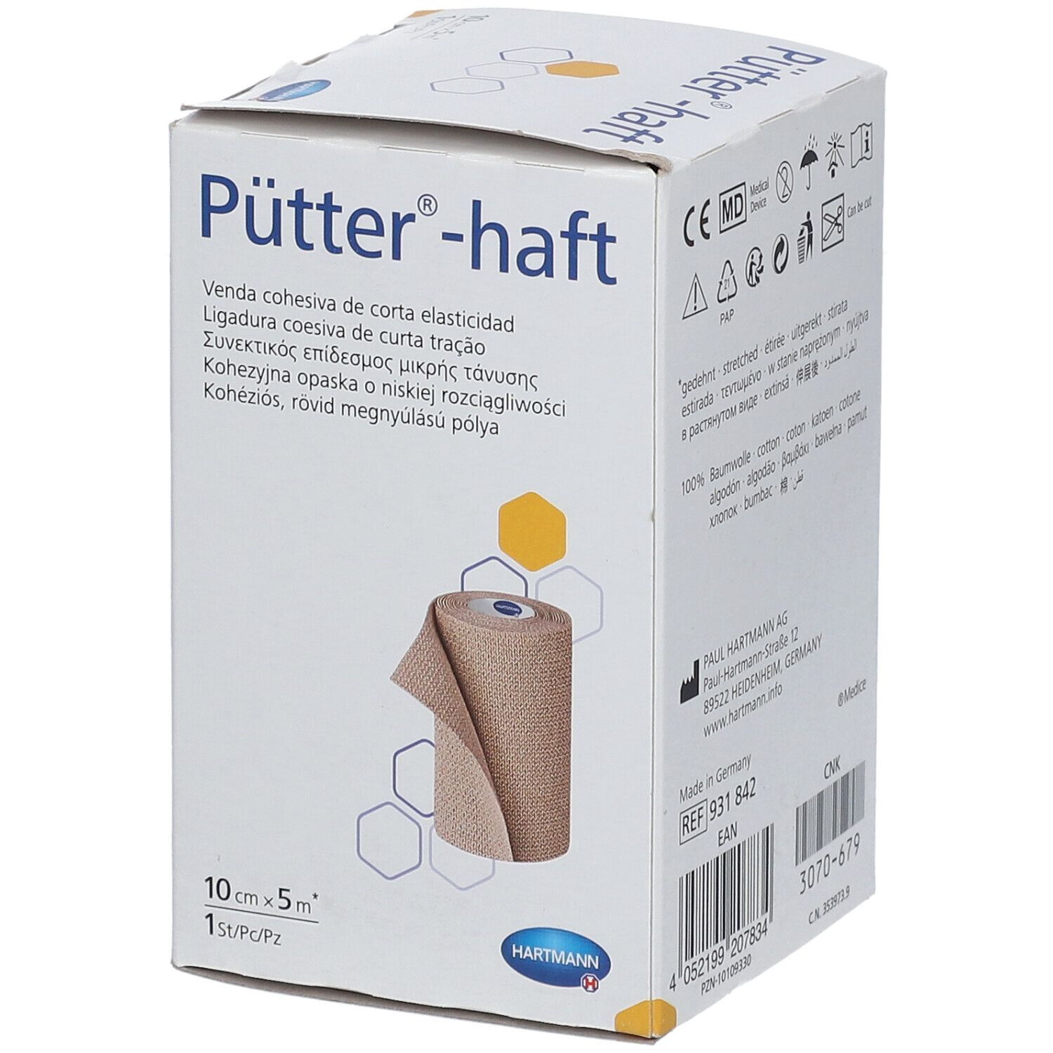 Hartmann Pütter-haft, bandage cohésif à allongement court. Rouleau beige dans emballage blanc. 10cm x 5m. Inscriptions multilingues.