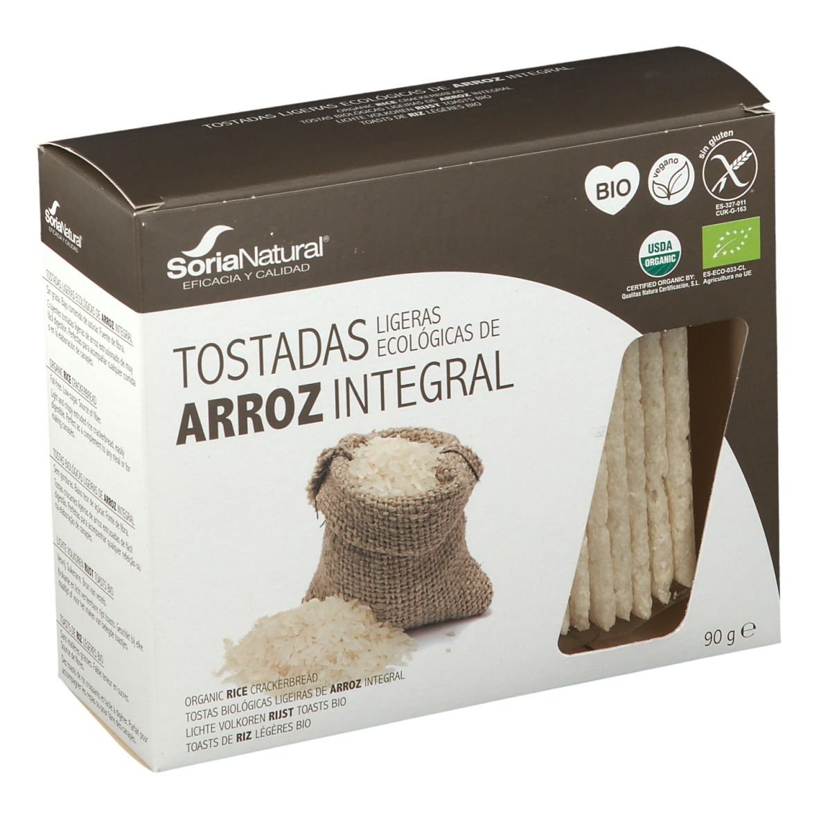 Boîte de toasts de riz. Fenêtre. Inscriptions : Soria Natural, BIO, sans gluten. Riz et sac représentés.