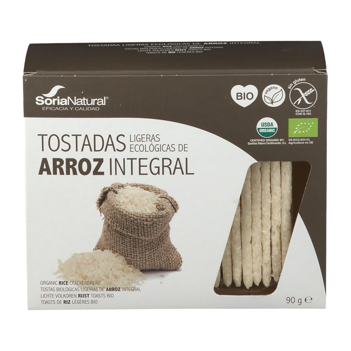 Boîte de toasts de riz. Fenêtre. Inscriptions : Soria Natural, BIO, sans gluten. 90g. Riz et sac représentés.