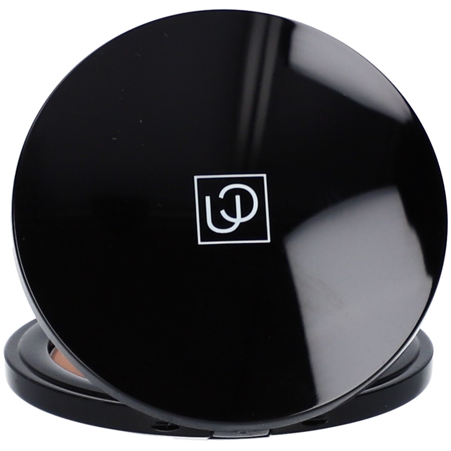 Palette de poudre bronzante ronde fermée. Cadre noir, poudre brun clair. Couvercle avec logo.