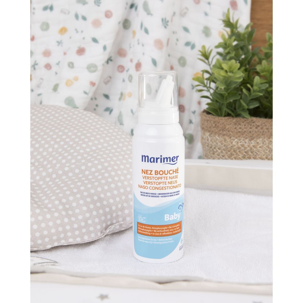 Flacon spray. Inscription: marimer baby. Nom du produit: Nez bouché. Logo bébé.