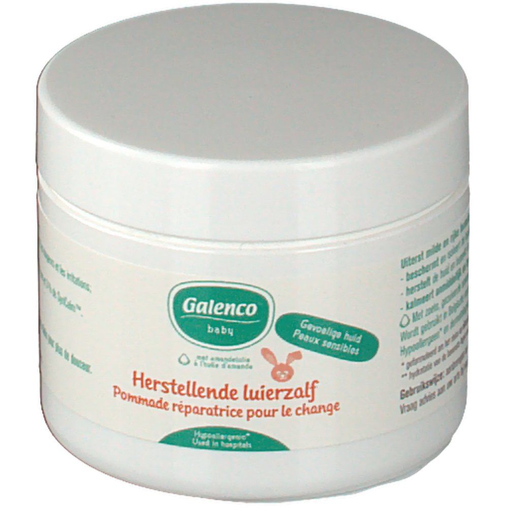 Pot rond blanc avec couvercle. L'étiquette indique "Galenco baby" et "Herstellende luierzalf Pommade réparatrice pour le change".