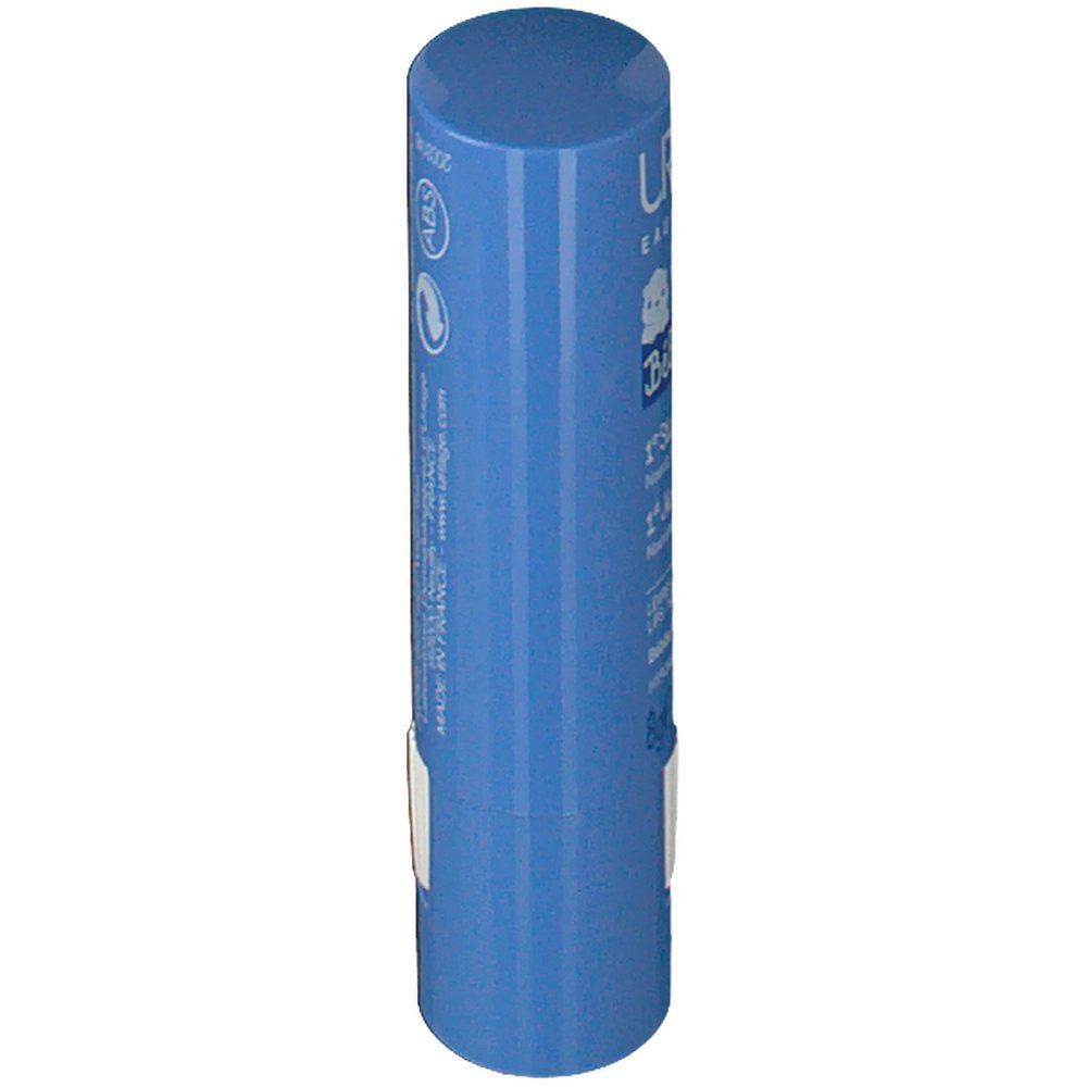 Stick bleu, vue oblique. Autocollant blanc avec texte. Logo Uriage et nom du produit partiellement visibles.