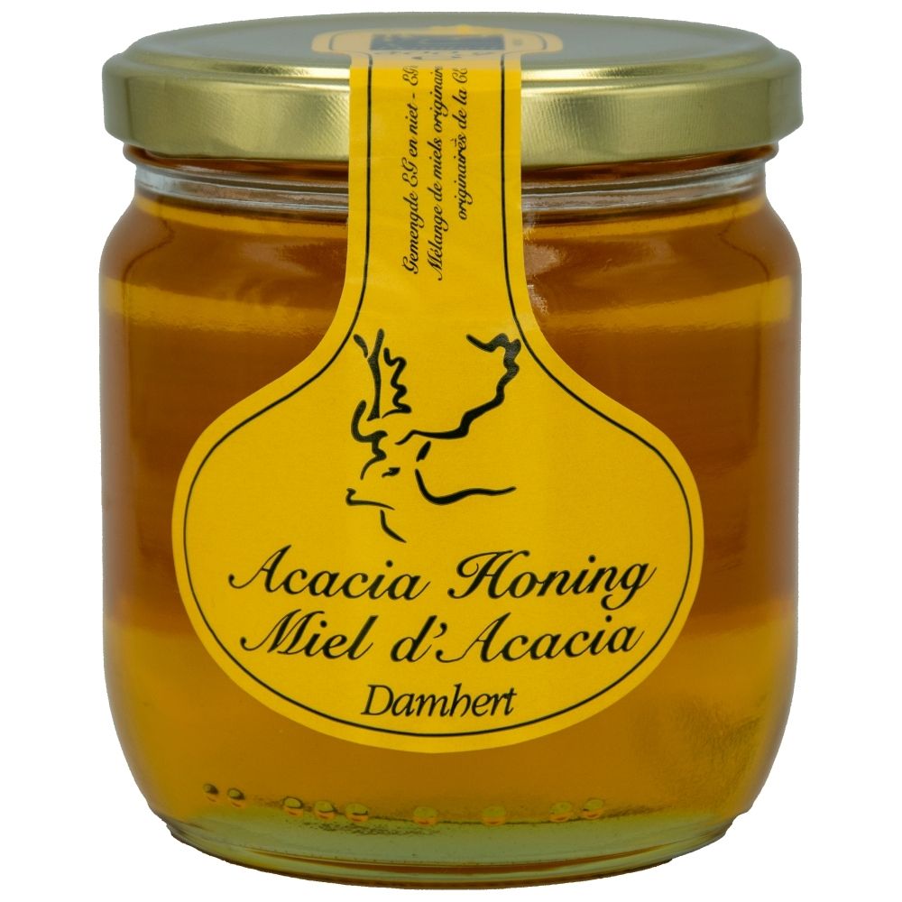 Bocal de miel d'acacia avec étiquette jaune indiquant 'Miel d'Acacia'.