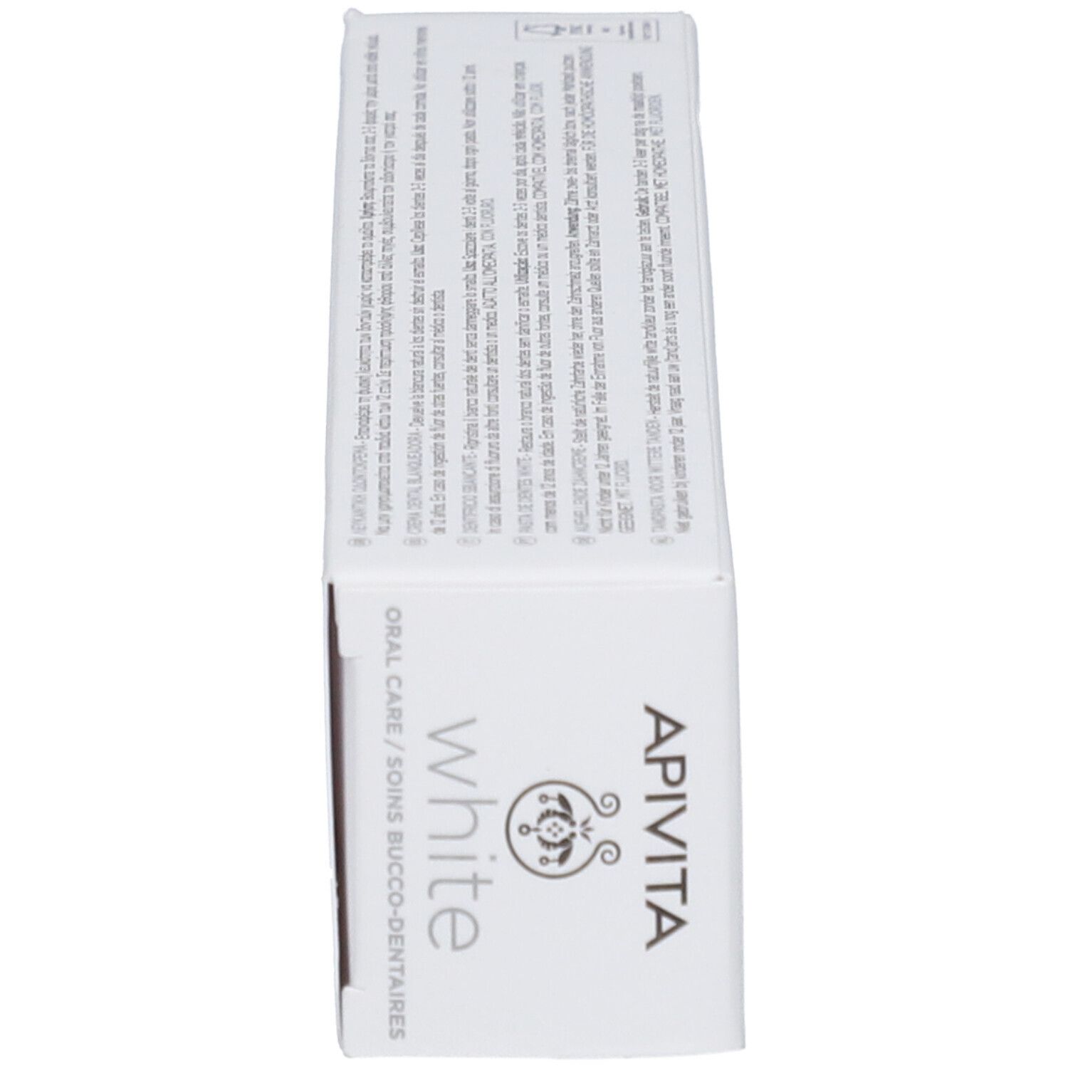 Boîte de dentifrice APIVITA White avec inscriptions et logo.