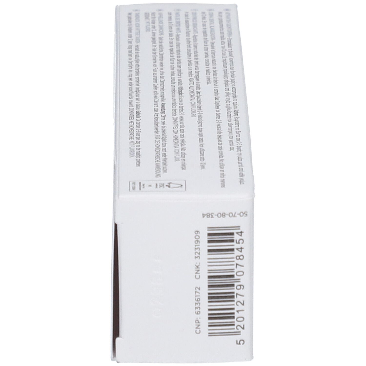 Emballage blanc avec texte noir et code-barres. Contient des instructions et des informations produit.