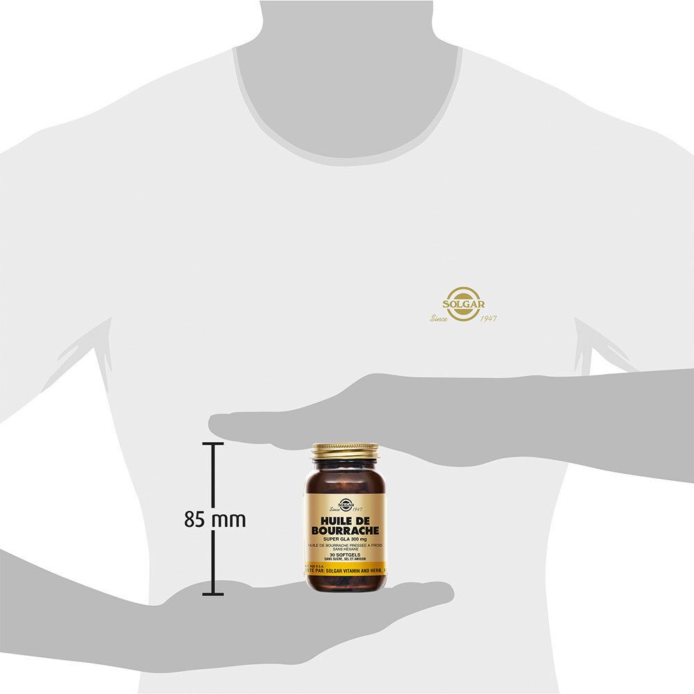 Homme tenant un flacon. Flacon : Solgar Huile de Bourrache, 85 mm de haut.