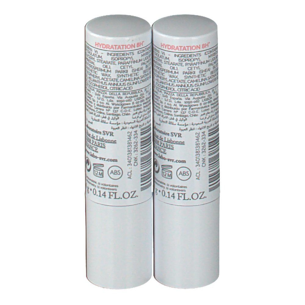 Deux sticks à lèvres blancs. Dos avec ingrédients et code-barres. Inscription: 0.14 FL.OZ.