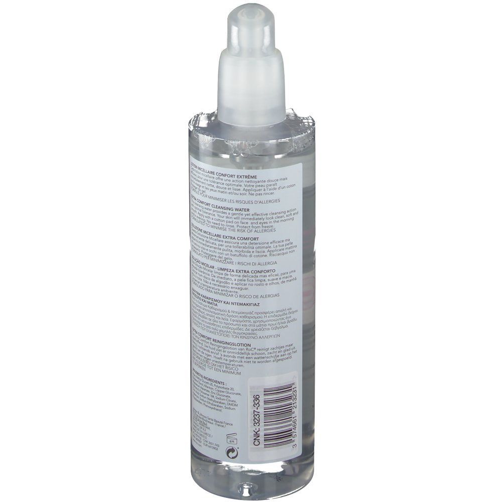 Flacon transparent avec pompe. Vue arrière avec texte. Informations sur le produit sur l'étiquette.