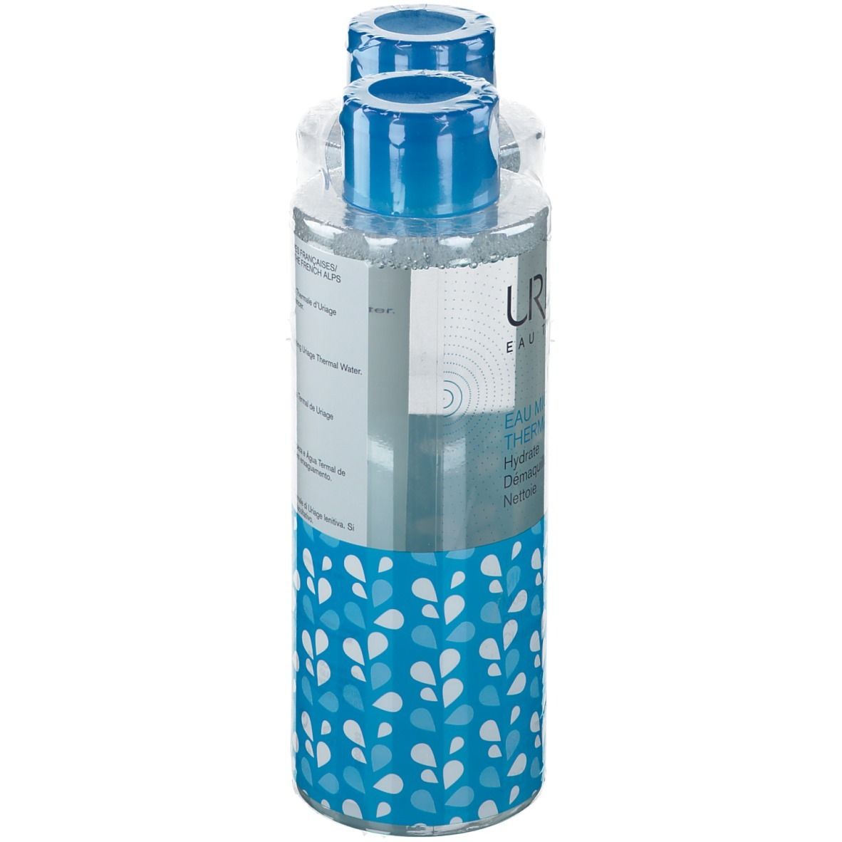 Flacon Uriage Eau Thermale Micellaire, emballé. Bouchon bleu, flacon transparent, motifs bleus et blancs. Étiquette produit visible.