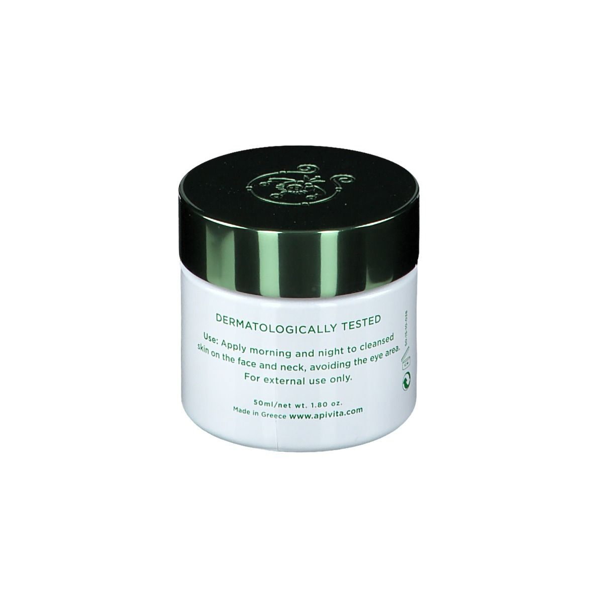 Pot de crème blanc avec couvercle vert. Inscription : Testé dermatologiquement. Mode d'emploi. 50ml/net wt. 1.8oz.