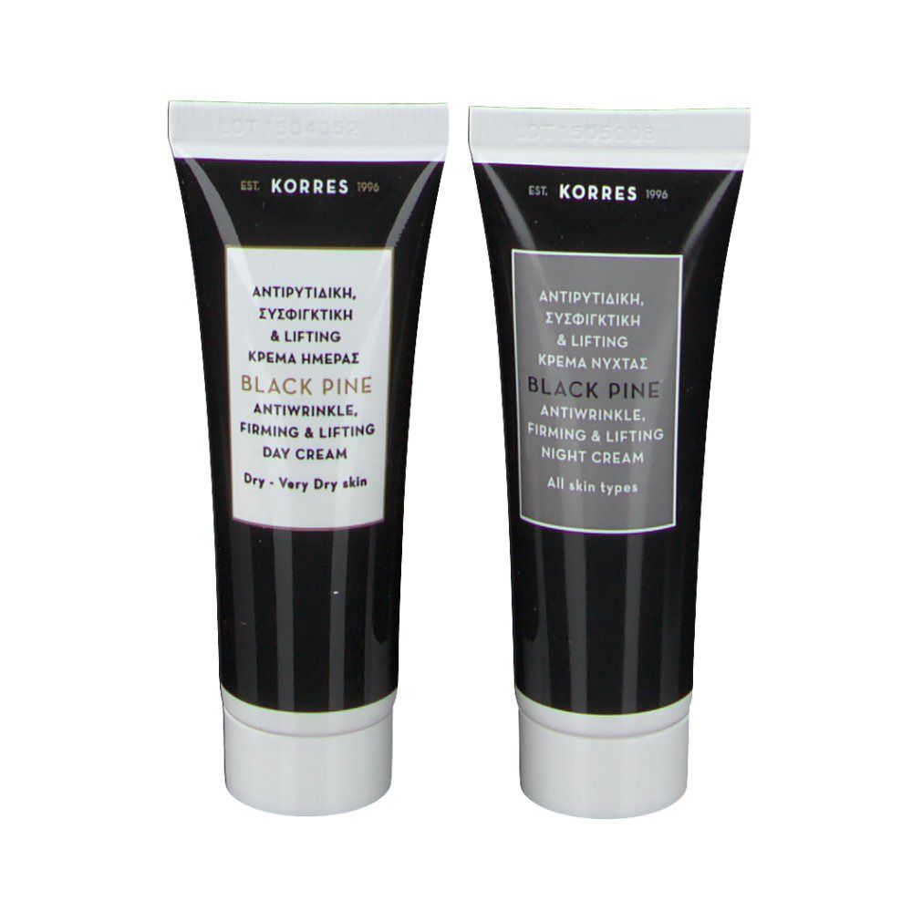 Deux tubes de crème KORRES Black Pine jour et nuit. Tubes noirs avec texte blanc. Crème de jour pour peaux sèches, crème de nuit pour tous types de peau.