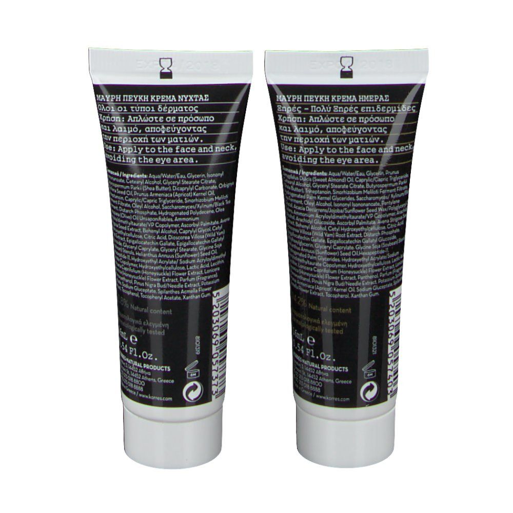 Deux tubes de crème KORRES Black Pine, vue arrière. Tubes noirs avec texte blanc. Avec liste d'ingrédients et informations fabricant.