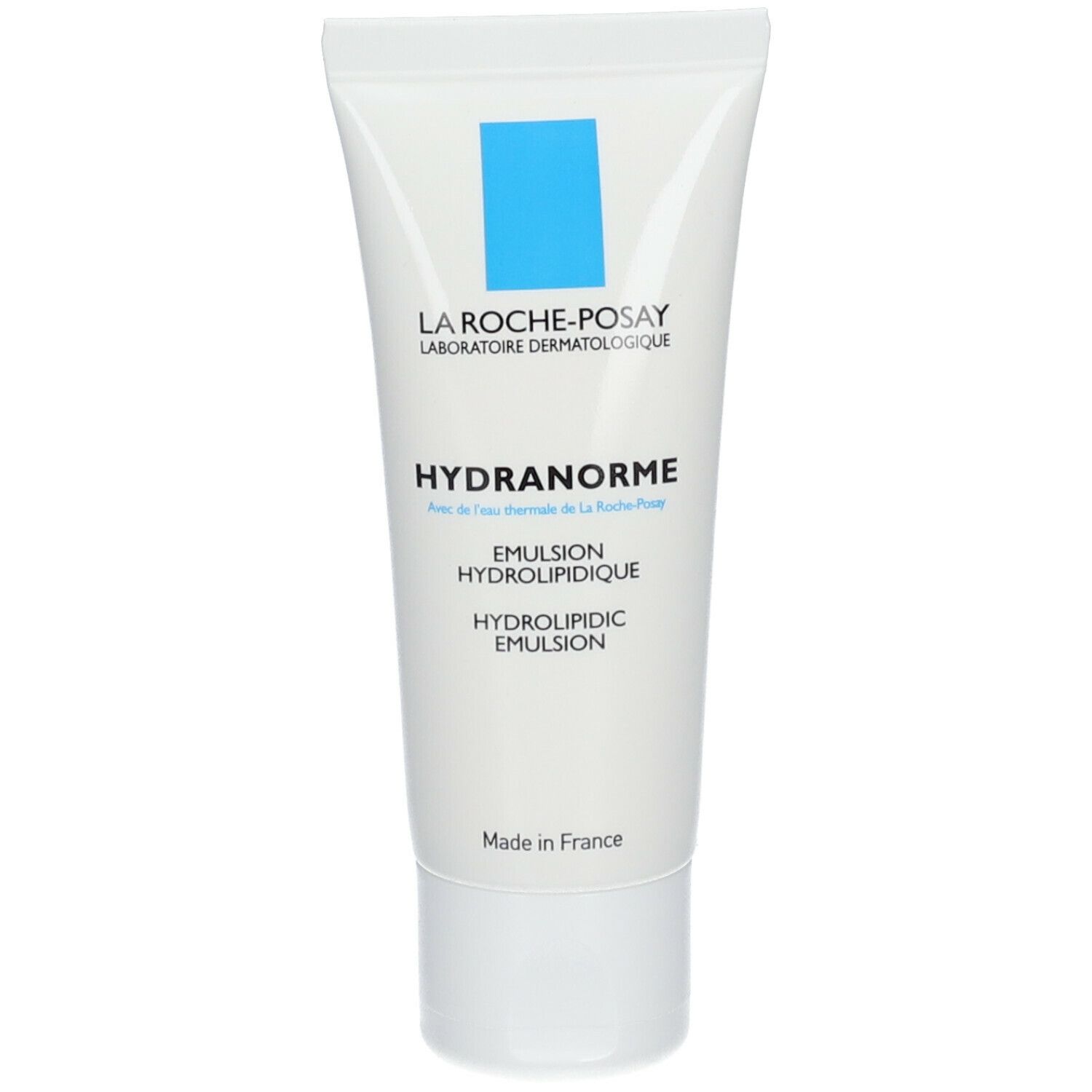 Tube blanc avec rectangle bleu et texte. Nom du produit: HYDRANORME. Émulsion pour le visage.