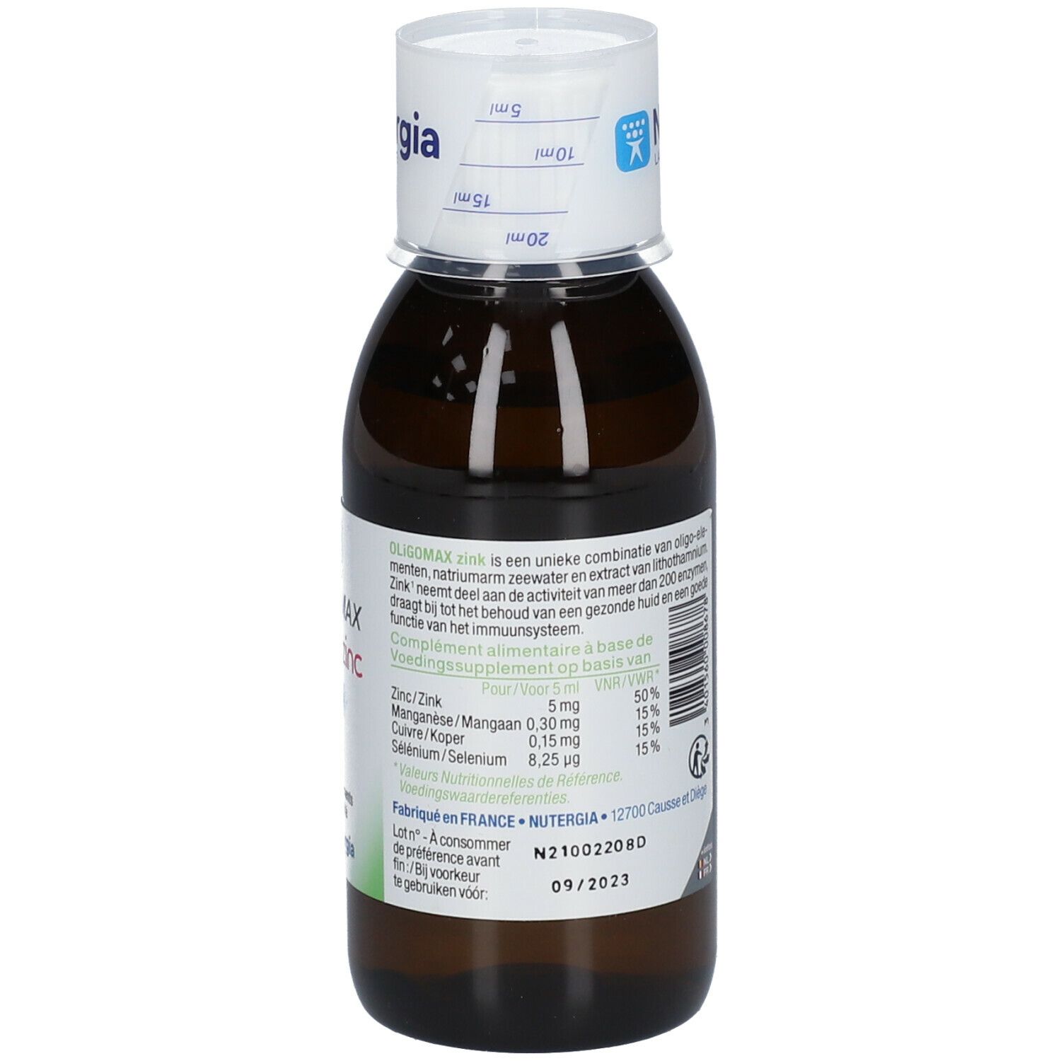 Flacon en verre brun avec bouchon blanc. Étiquette avec Oligomax zinc. Marque: Nutergia. 150 ml.