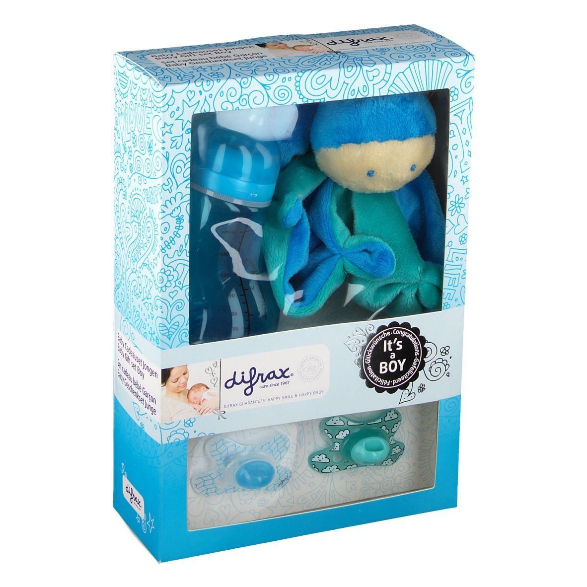 Coffret cadeau avec biberon, sucettes et peluche. Marque visible : Difrax. Inscription "It's a Boy".
